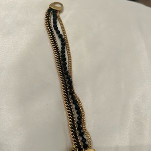 Black and gold Henri Bendel bracelet. EUC.